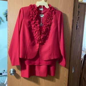 3 piece dress. Skirt, sleeveless blouse, long sleeved jacket